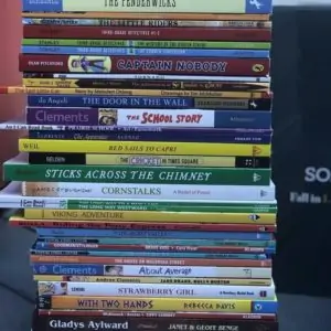 a pile of books stacked on top of each other