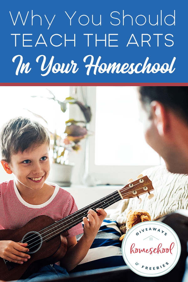 Boy playing guitar with dad