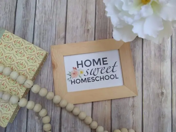 Home Sweet Homeschool sign in a wooden frame
