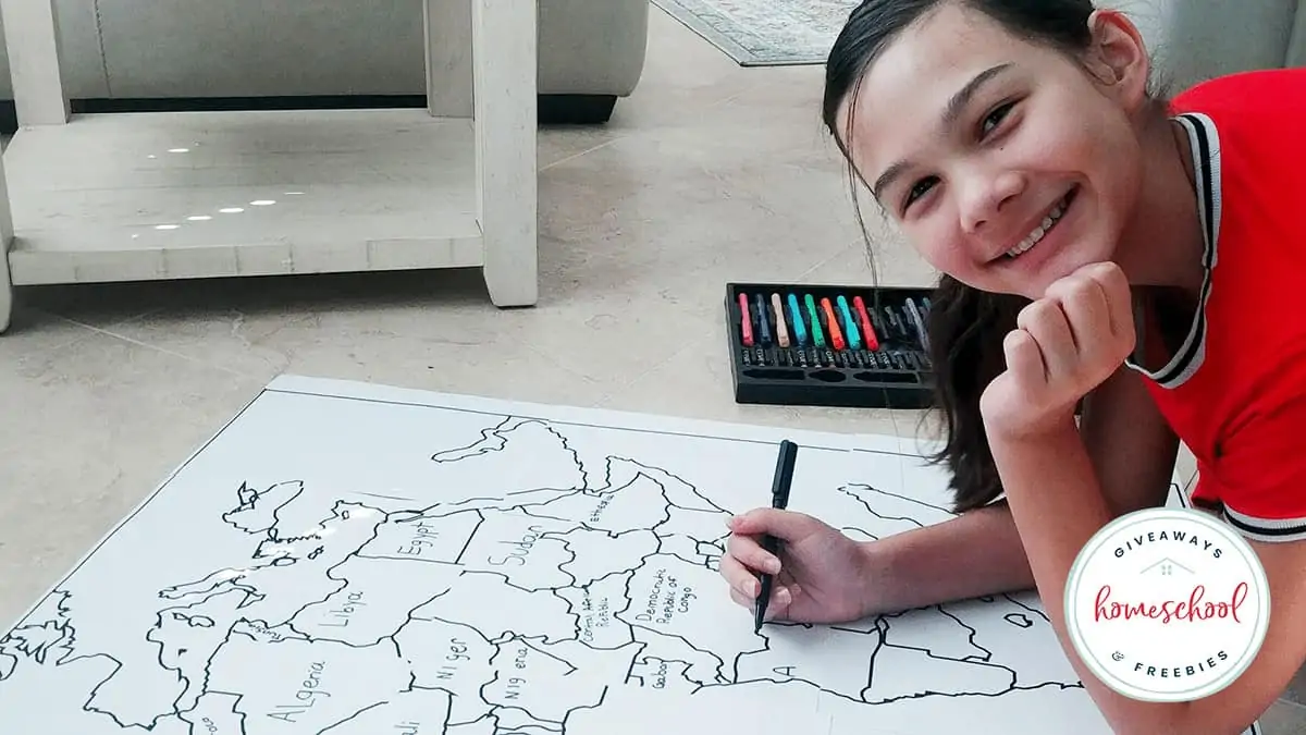 image of a child labeling a map