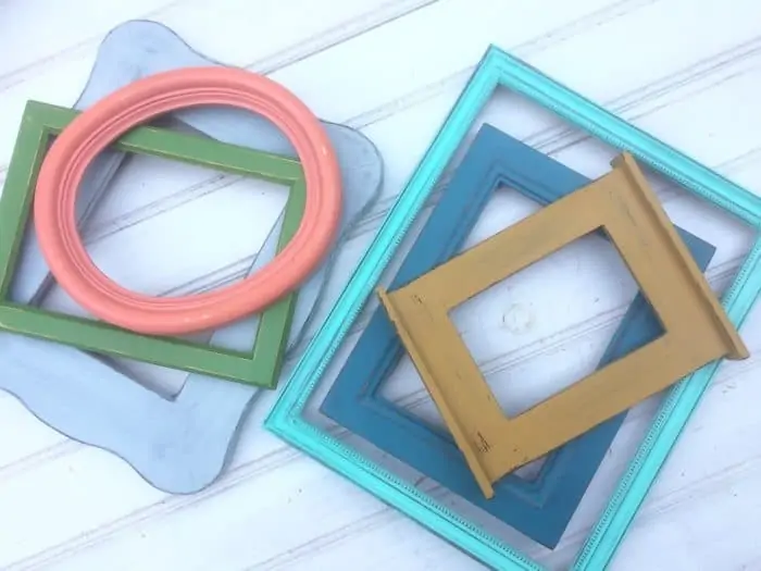 different colored spray painted picture frames