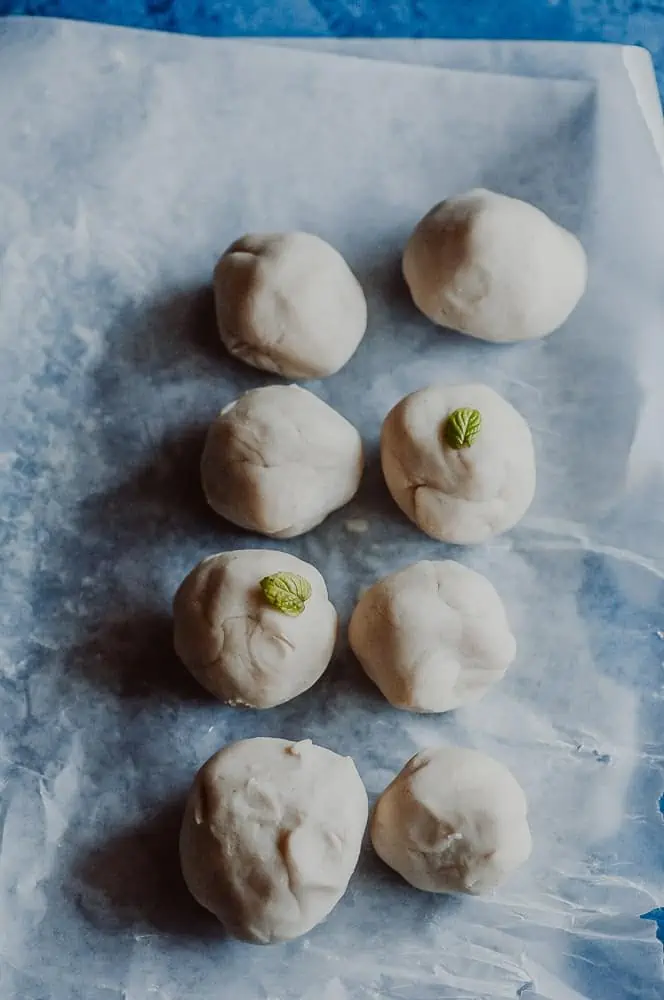 playdough balls with peppermint leaves.