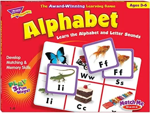 This image of the Match Me Learn the Alphabet Game. It is red with yellow lettering and the matching cards.