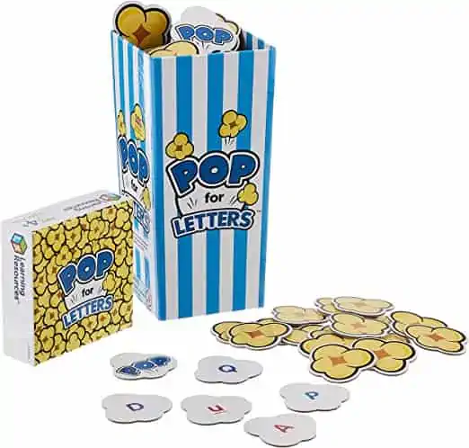 This image is of the Pop Cards Alphabet Recognition Game which is shaped like a popcorn box, along with the popcorn shaped game pieces.