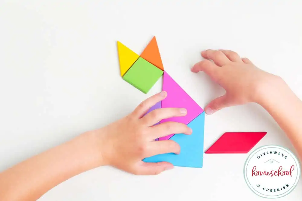 a child playing with a tangram puzzle