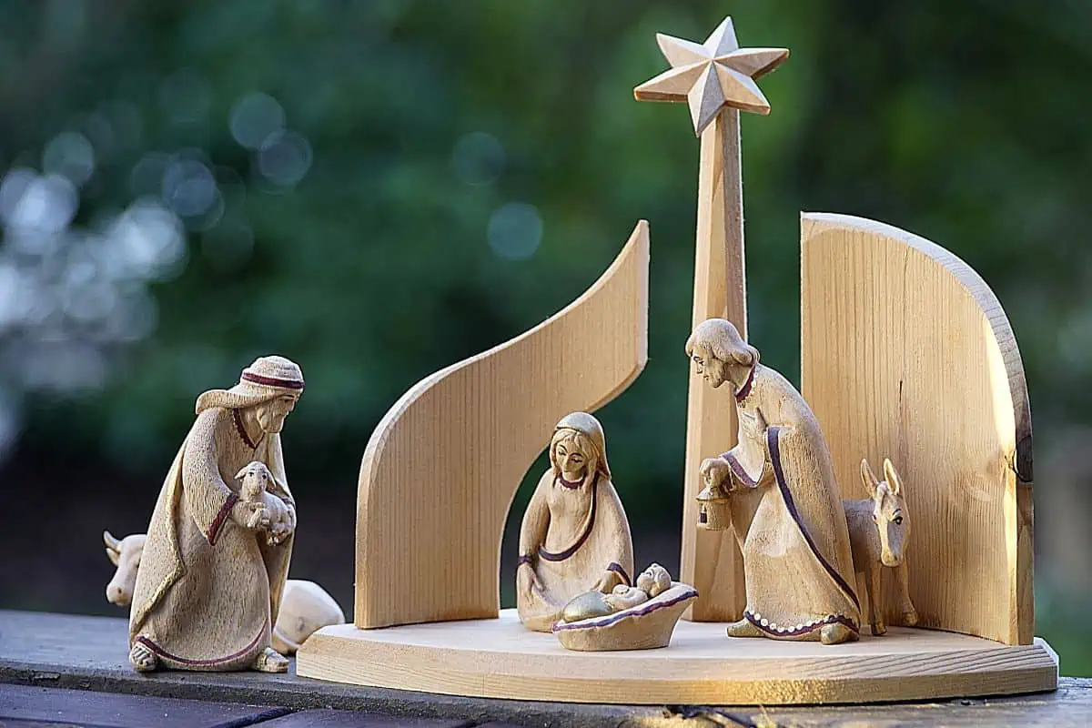 best nativity movies showing a wooden nativity set on a table 